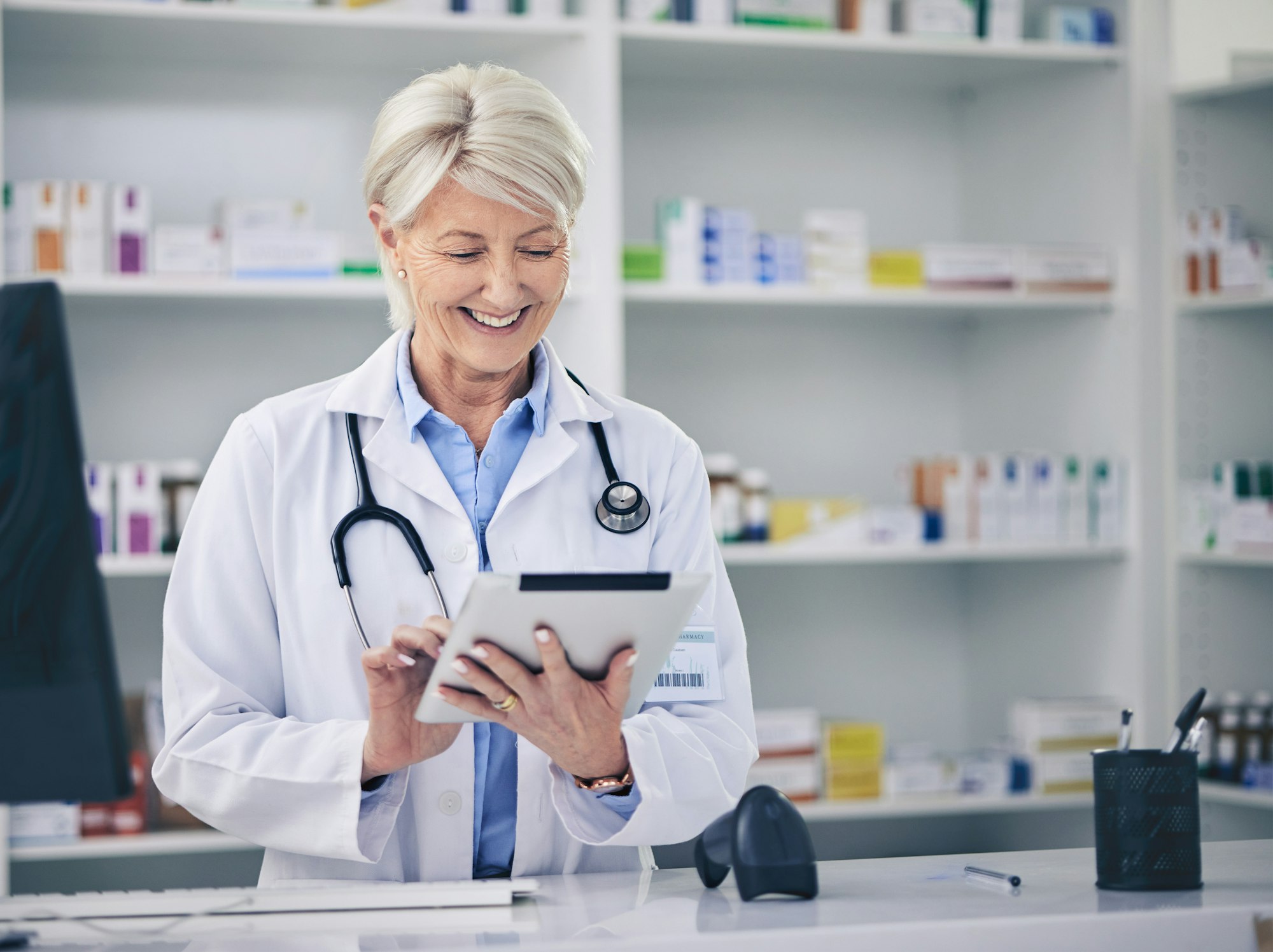 Woman, medicine and pharmacy with tablet for inventory, stock list or online prescription. Pharmaci